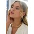 Platte grove ketting met bloemetjes hanger - goud